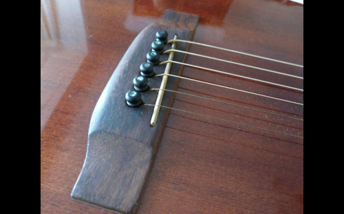 Daion 78 Heritage acoustic guitar, bridge close up