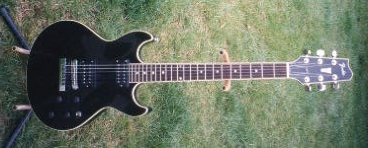 Black Fender Flame electric guitar Front view